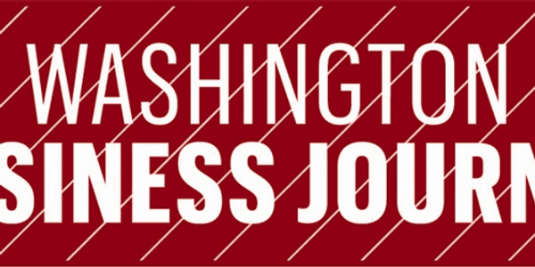 Red banner with diagonal white lines and bold white text reading "Washington Business Journal.